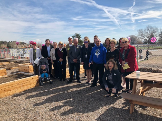 Large group photo in the garden